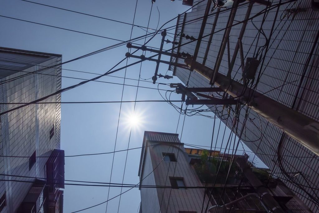 Compact Apartments Inspire Calmer, Multi-Use Living Spaces exterior of apartment buildings in the city