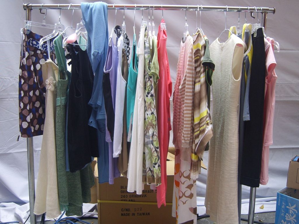 Slow Fashion and Resale Reshape Everyday Wardrobes A rack of clothes in a boutique